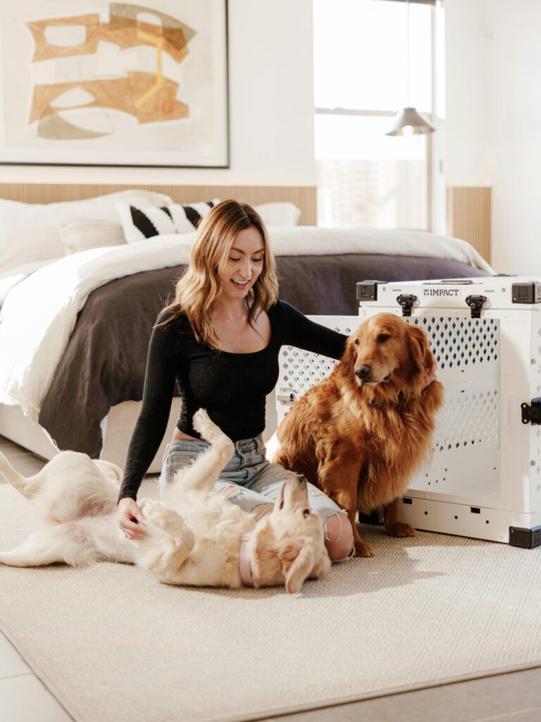 qoman petting her dog